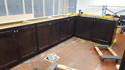 New cabinets installed in a kitchen.